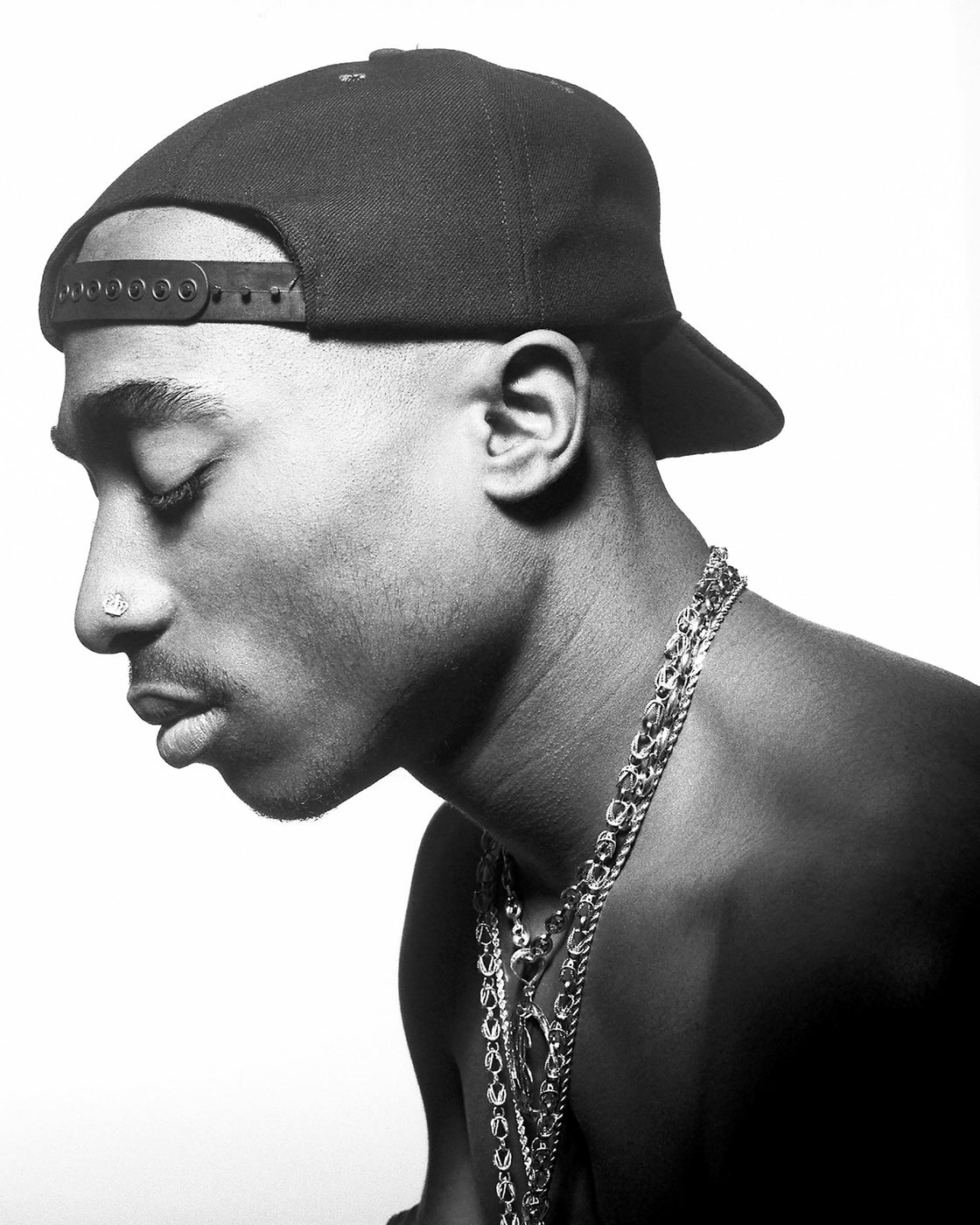 Tupac Shakur signed index card “Thugs & Kisses”